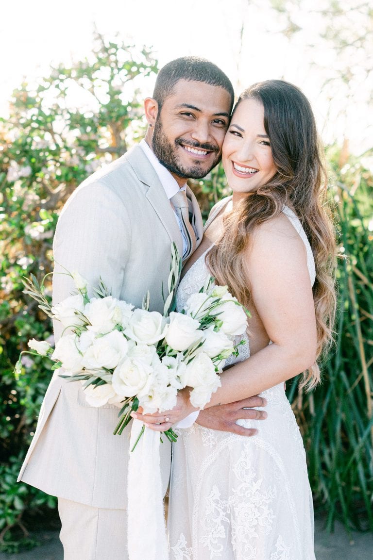 Newlywed smiling with joy at the camera | photo by Amy Huang Photography a San Diego Wedding Photographer