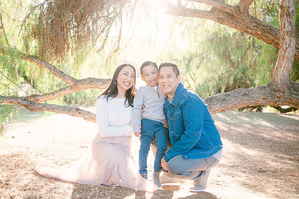 Beautiful Family under a tree in Los Penasquitos Preserve taken by Amy Huang Photography