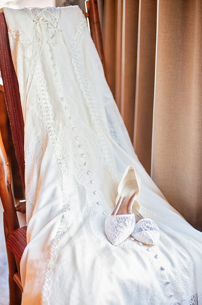 Kayla's Beautiful Wilderly Wedding Dress and shoes from Kayla and Jackson's Rustic Mammoth Lake Wedding, Photo taken by Amy Huang Photography